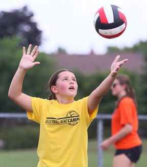 Claire Perini, 11, serves during the annual Kent Volleyball Camps at St. Clair College's Chatham Campus HealthPlex in Chatham, Ont., Friday, Aug. 5, 2022. Mark Malone/Chatham Daily News/Postmedia Network