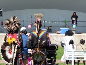 Indigenous performers look on from the crowd at the FSMA 10 year anniversary. Photo by James Bonnell.