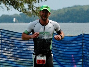 Spencer Summerfield just before the finish line in the Bruce Peninsula Multisport Race in Wiarton, Ont. on Saturday, Aug. 7, 2022. (Scott Dunn/The Sun Times/Postmedia Network)