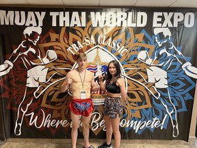 Anthony Palombo and Ocean Cofre take a team photo at the TBA Muay Thai World Expo, where Cofre made it to semi finals and Palombo came home with a championship. Photo courtesy of Bellagarde's Dragons
