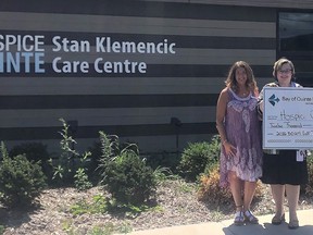 Hospice Quinte Executive Director Jennifer May-Anderson (centre), Donor Relations & Communications Manager Sandi Ramsay and Bay of Quinte Mutual Insurance Company Board Chair Fred Lang, were on hand at the Stan Klemencic Care Centre this week for a $12,000 cheque presentation. The money was raised by Mutual's annual charity golf  tournament. SUBMITTED PHOTO