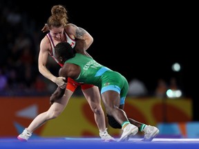 Brantford native Madison Parks (red) of Team Canada competes against Miesinnei Mercy Genesis (blue) of Team Nigeria during the Women's Wrestling Freestyle 50 kg Gold Medal match on Aug. 6 at the Birmingham 2022 Commonwealth Games in Coventry, England. Genesis won the match and the gold medal. Parks won silver. (Photo by Dean Mouhtaropoulos/Getty Images)