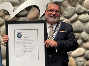 Brant County Mayor David Bailey holds a certificate acknowledging the municipality reaching the platinum-level from the World Council on City Data for the third consecutive year. SUBMITTED