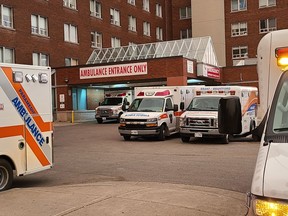 Paramedics are often forced to park on the street while transporting patients to the Brant Community Healthcare System emergency department at the Brantford General Hospital. Local paramedics say patient off-loading delays and other issues including an increase in calls for service are putting the community at risk. SUBMITTED PHOTO