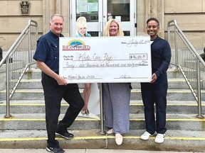 The 14th annual Brantford Mayor's Gala held in April raised almost $47,000 for Kids Can Fly. On hand for the presentation were, from left, Mayor Kevin Davis; Jeanne Smitiuch, director for Dollywood Foundation of Canada; and Dr. Sarangan Uthayalingam, local pediatrician and KCF board member.