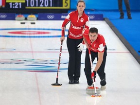 John Morris, shown here with Canadian teammate Rachel Homan at the Beijing 2022 Winter Olympics, is excited for the new Mixed Doubles Super Series curling event in Canada that is being put together by Brantford's Jay Allen and Wayne Tuck. Gavin Young/Postmedia