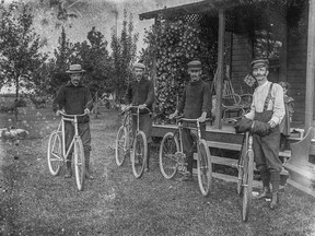 Left to right, Mr. Stevens (Stevenson), Charles Austin, W. H. "Harry" Westman, A. D. Westman at Highbanks, near Cedar Springs in 1896. Austin Wright photo