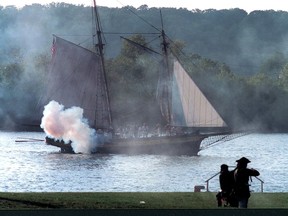 HMS Bee fires at enemy forces in a 1998 re-enactment. It is a replica of the original gunboat that was built over the winter of 1816-17 to help patrol the upper Great Lakes. HMS Bee delivered John Galt to the mouth of the Maitland River on June 29, 1827, at which time he met Dr. William 'Tiger' Dunlop to found the Town of Goderich. Handout