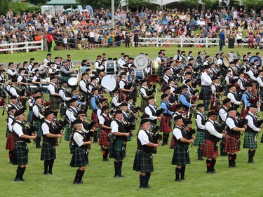 Some of the bands on the infield at the Massed Pipe Bands at the Glengarry Highland Games. Photo on Saturday, July 30, 2022, in Maxville, Ont. Todd Hambleton/Cornwall Standard-Freeholder/Postmedia Network