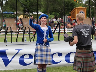 A MacCulloch Dancers member doing some media work before the Massed Highland Fling at the opening ceremonies. Photo on Saturday, July 30, 2022, in Maxville, Ont. Todd Hambleton/Cornwall Standard-Freeholder/Postmedia Network