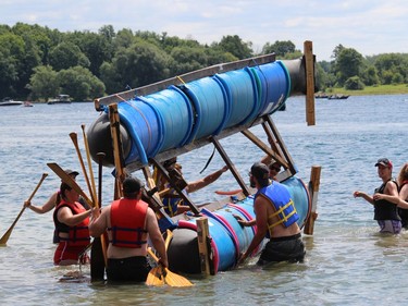 A Tubie Festival team tries to resurrect its craft before the race. Photo on Sunday, August 31, 2022, in Morrisburg, Ont. Todd Hambleton/Cornwall Standard-Freeholder/Postmedia Network