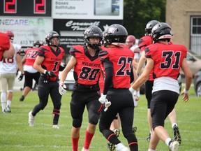 Cornwall Wildcats players including Troy Malyon (80) celebrate a score during what would be a 35-29 playoff win against the Niagara Spears. Photo on Saturday, July 30, 2022, in Cornwall, Ont. Todd Hambleton/Cornwall Standard-Freeholder/Postmedia Network