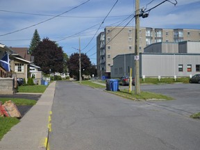 A view of Trinity Avenue in Cornwall, with residential homes seen on the left, and the building -- which houses Centre 105 and other organizations -- seen in the foreground on the right, pictured on Wednesday August 3, 2022 in Cornwall, Ont. Shawna O'Neill/Cornwall Standard-Freeholder/Postmedia Network