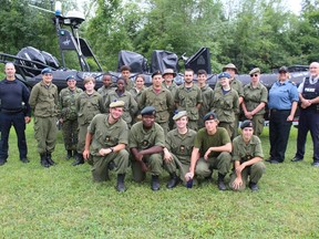 Cadets and staff at CAP in Lakeview Heights, and with Thursday special guests Const. Patrick Bouchard (far left) and Const. Mark Villeneuve (far right) of the RCMP in Cornwall. Photo on Thursday, August 4, 2022, in Lakeview Heights, Ont. Todd Hambleton/Cornwall Standard-Freeholder/Postmedia Network