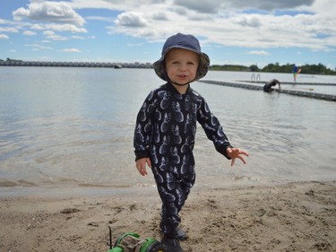 Mavrick Sanders playing along the water during Iroquois Beach Day on Friday August 12, 2022 in South Dundas, Ont. Shawna O'Neill/Cornwall Standard-Freeholder/Postmedia Network