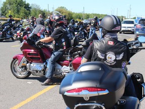 Some of the riders in the parking lot at the plaza in Long Sault getting ready to head out for the Cruisers 4 Kids Poker Run and Bike Night fundraiser. Photo on Saturday, August 13, 2022, in Long Sault, Ont. Todd Hambleton/Cornwall Standard-Freeholder/Postmedia Network