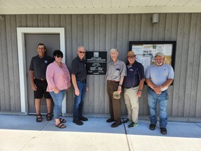 From left: South Dundas Coun. Archie Mellan, Deputy Mayor Kirsten Gardner, Mayor Steven Byvelds, John D. Ross, Coun. Donald William Lewis, and Coun. Lloyd Wells at the dedication of the John D. Ross Airport and Campground Building. Handout/Cornwall Standard-Freeholder/Postmedia Network