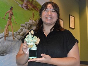 Montana Adams, administrative assistant at NNATC, passed around a traditional corn husk doll for children to see at OPG Saunders Hydro Dam Visitor Centre on Sunday August 14, 2022 in Cornwall, Ont. Shawna O'Neill/Cornwall Standard-Freeholder/Postmedia Network