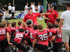 Cornwall Wildcats Mosquito Division coach Chris Leonard addresses players after their NCAFA home opener. Photo on Sunday, August 21, 2022, in Cornwall, Ont. Todd Hambleton/Cornwall Standard-Freeholder/Postmedia Network