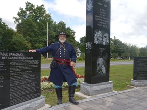 Vince Chiarelli, an executive and officer in charge of the Grays and Blues of Montreal infantry, standing with the Civil War monument at the Lost Villages Museum during fifth annual reenactments on Saturday August 27, 2022 in South Stormont, Ont. Shawna O'Neill/Cornwall Standard-Freeholder/Postmedia Network