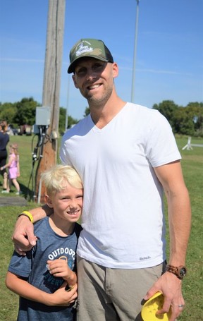 Sullivan (left) and Casey Grey enjoying some quality time together at the fair on Sunday August 28, 2022 in Chesterville, Ont. Shawna O'Neill/Cornwall Standard-Freeholder/Postmedia Network