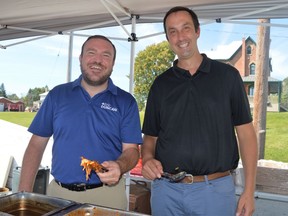 From left, SDSG MP Eric Duncan with MPP Nolan Quinn, enjoying themselves at the MP/MPP Picnic on Sunday August 28, 2022 in Cornwall, Ont. Shawna O'Neill/Cornwall Standard-Freeholder/Postmedia Network