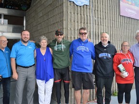 Supporters and members of the Spinning Wheel Tour, from left to right: Tom Olien, SDSG MP Eric Duncan, Virginia Lake, Steve Iseman, Mike Loghrin, Jim Redmond, Darlene Richards-Loghrin, and Mayor Glen Grant, pictured on Wednesday August 31, 2022 in Cornwall, Ont. Shawna O'Neill/Cornwall Standard-Freeholder/Postmedia Network