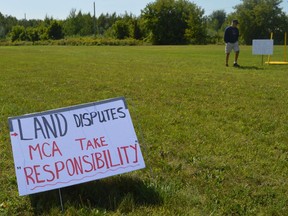 One of a few signs that were pegged near the four corners on Kawehno:ke (Cornwall Island) during a peaceful protest from residents regarding land certificates of possession, pictured on Thursday August 25, 2022 on Kawehno:ke. Shawna O'Neill/Cornwall Standard-Freeholder/Postmedia Network