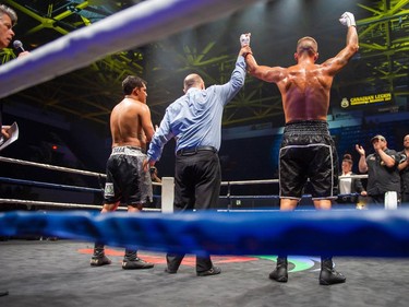 Hamilton's Jessie Wilcox, right, announced as the winner against Ricardo Lara on Monday August 8, 2022 in Cornwall, Ont. Wilcox knocked Lara out in the third round. Robert Lefebvre/Special to the Cornwall Standard-Freeholder/Postmedia Network