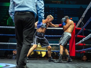 Hamilton's Jessie Wilcox, left, lands a punch on Ricardo Lara on Monday August 8, 2022 in Cornwall, Ont. Wilcox knocked Lara out in the third round. Robert Lefebvre/Special to the Cornwall Standard-Freeholder/Postmedia Network