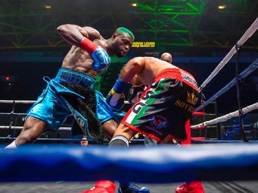 Montreal's Mohamed Soumaoro, left, goes to hit Isaac Casten on Monday August 8, 2022 in Cornwall, Ont. Soumaoro won in a unanimous decision after six rounds. Robert Lefebvre/Special to the Cornwall Standard-Freeholder/Postmedia Network