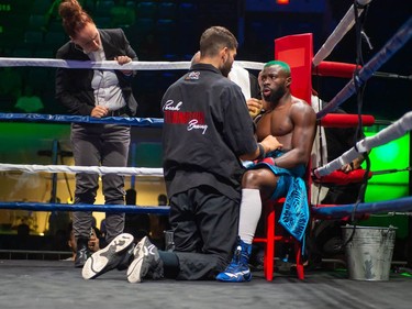 Montreal's Mohamed Soumaoro gets attention from his coach during his fight against Isaac Casten on Monday August 8, 2022 in Cornwall, Ont. Soumaoro won in a unanimous decision after six rounds. Robert Lefebvre/Special to the Cornwall Standard-Freeholder/Postmedia Network