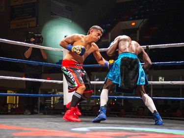 Montreal's Mohamed Soumaoro, right, takes a punch from Isaac Casten on Monday August 8, 2022 in Cornwall, Ont. Soumaoro won in a unanimous decision after six rounds. Robert Lefebvre/Special to the Cornwall Standard-Freeholder/Postmedia Network