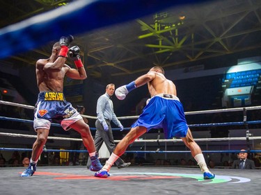 Toronto's Adrian Bembridge, left, faces off against Luis Guerrero Ochoa on Monday August 8, 2022 in Cornwall, Ont. Bembridge knocked out his opponent near the end of the first round. Robert Lefebvre/Special to the Cornwall Standard-Freeholder/Postmedia Network