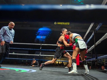 Montreal's Caroline Veyre, left, lands one on Mexican Marisela Borquez on Monday August 8, 2022 in Cornwall, Ont. Veyre won in a unanimous decision. Robert Lefebvre/Special to the Cornwall Standard-Freeholder/Postmedia Network