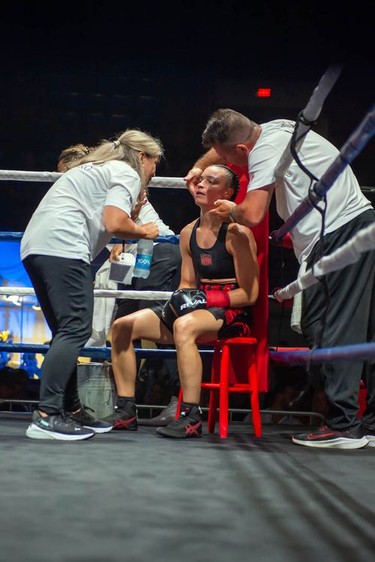 Montreal's Caroline Veyre gets some care in her corner during her bout against Mexican Marisela Borquez on Monday August 8, 2022 in Cornwall, Ont. Veyre won in a unanimous decision. Robert Lefebvre/Special to the Cornwall Standard-Freeholder/Postmedia Network