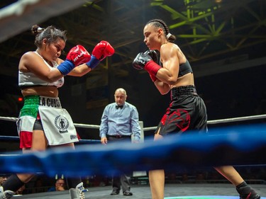 Montreal's Caroline Veyre, right, goes up against Mexican Marisela Borquez on Monday August 8, 2022 in Cornwall, Ont. Veyre won in a unanimous decision. Robert Lefebvre/Special to the Cornwall Standard-Freeholder/Postmedia Network