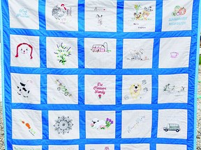 A friendship quilt, crafted by fans of the 'Wandering Back to Saskatchewan' book series, is currently on display at the Devon Public Library. (Supplied)