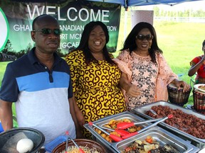 People from the Ghanaian Canadian Association of Fort McMurray serve food at the Afro-Canadian Festival of Arts and Culture, held at J. Howard Pew Park by the Rehoboth Alliance, on Saturday, August 13, 2022. Vincent McDermott/Fort McMurray Today/Postmedia Network