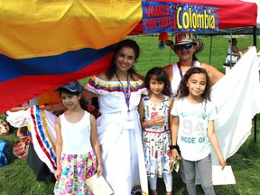 Rehoboth Alliance on Saturday, August 13, 2022 by J.J.  People representing Colombia at the Afro-Canadian Arts and Culture Festival held at Howard Pew Park.  Vincent McDermott/Fort McMurray Today/Postmedia Network