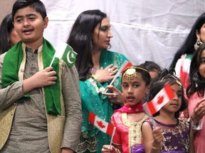 Children sing the Canadian and Pakistani anthems at an event celebrating Pakistan's 75th Independence Day in Fort McMurray on Saturday August 13, 2022. Vincent McDermott/Fort McMurray Today/Postmedia Network