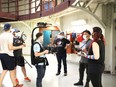 Crew shot in main cell dome at Kingston Penitentiary (from L-R: Brody McMaster and Braden Dragomir from Untold Storytelling, working as 1st AC and Key Gaffer respectively / Jordan Bryon, Director of Photography / Clarke Bender, Grip and Electric Swing / David Fernandes, 1st Assistant Director / Anita Doron, Director). Vicky Zhang photo