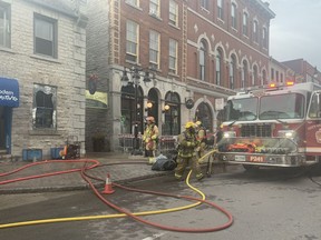 Kingston Fire and Rescue respond to a fire at the downtown boutique Modern Primitive on Princess Street early Thursday.