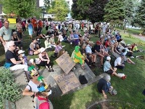 Opponents of the former Davis Tannery redevelopment gather in Confederation Park ahead of the planning committee meeting where the project was discussed in Kingston on Aug. 4, 2022.