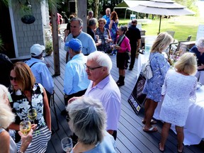More than 100 people attended the 15th annual Summer Evening in the Islands fundraiser for the Thousand Islands History Museum held on Flying Mallard Island on August 11. Lorraine Payette/for Postmedia Network