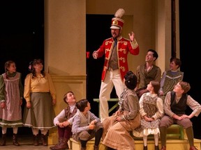 The Cast of The Music Man (2022). Directed and Choreographed by Stephanie Graham; Music Direction by Rachel Cameron; Assistant Choreographed by Keleshaye Christmas-Simpson; Set Design by Brandon Kleiman; Costume Design by Robin Fisher & Joshua Quinlan; Lighting Design by Renee Brode; Sound Design by Deanna Choi; Stage Managed by Jordan Guetter; Assistant Stage Managed by Cristina Hernadez; Apprentice Stage Managed by Arielle Voght. Photo by Randy deKleine-Stimpson. - supplied by Thousand Islands Playhouse