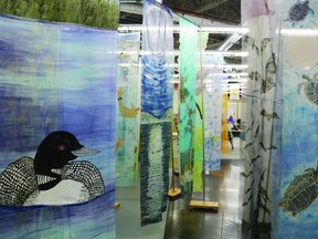 The Loon by Diana Cole (left) is one of over 30 panels part of the All Beings Confluence's 'Alberta Pod,' on display at the Leduc Arts Foundry until the end of the month. (Peter Williams)
