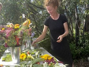 Chelsea Anderson helps her guests build their own bouquets after they pick whatever it is they want.