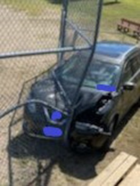 An SUV hit and damaged a fence just off Arena Road in the Madawaska Valley Monday morning around 11 a.m. Photo by Ontario Provincial Police