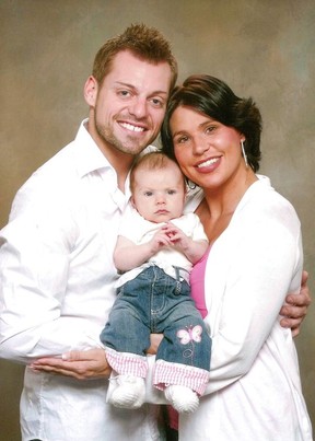 Master Corporal. Scott Vernelli and Marcie Lane with their baby girl Olivia.